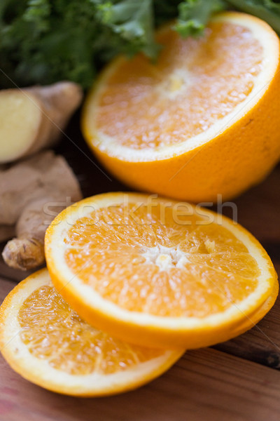 close up of ogange, ginger and lettuce salad Stock photo © dolgachov