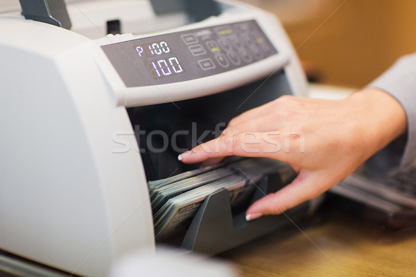 dollars in electronic money counter at bank office Stock photo © dolgachov