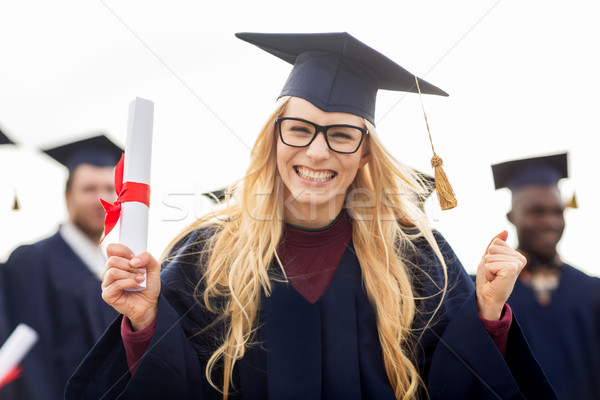 [[stock_photo]]: Heureux · étudiant · diplôme · célébrer · graduation · éducation