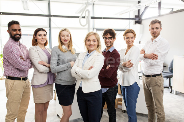 happy business team in office Stock photo © dolgachov