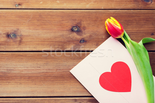 close up of flowers and greeting card with heart Stock photo © dolgachov