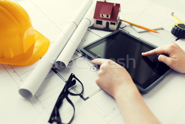 close up of hand with blueprint and tablet pc Stock photo © dolgachov