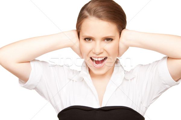 woman with hands on ears Stock photo © dolgachov