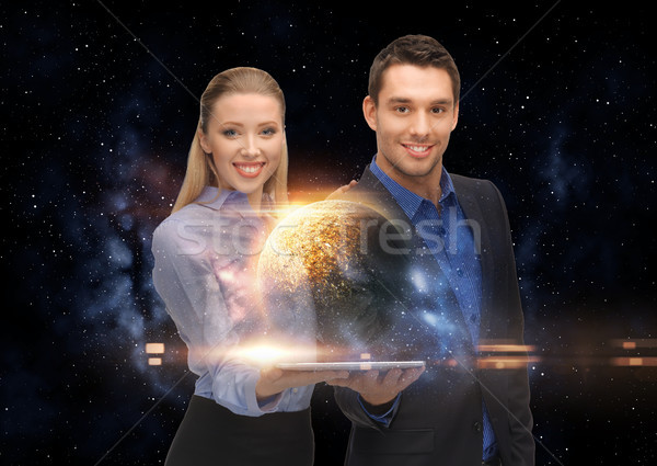 businesspeople with tablet pc and planets in space Stock photo © dolgachov