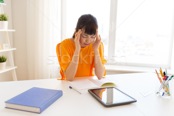 asian student girl with tablet pc learning at home Stock photo © dolgachov