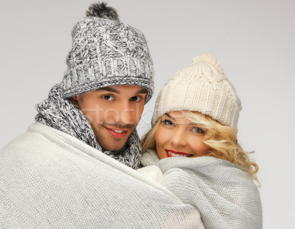 family couple under warm blanket Stock photo © dolgachov