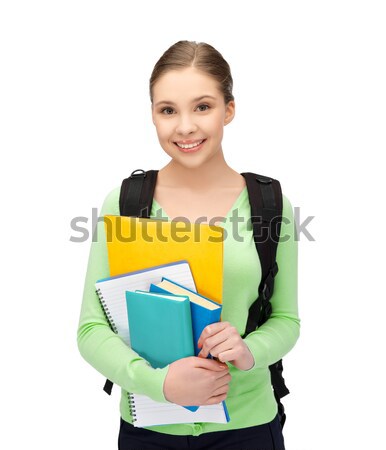 student with books and schoolbag Stock photo © dolgachov
