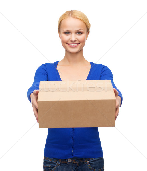 Stockfoto: Glimlachende · vrouw · toevallig · kleding · vak · post