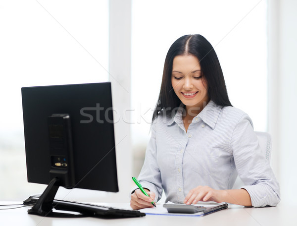 Stockfoto: Zakenvrouw · student · werken · calculator · business · onderwijs