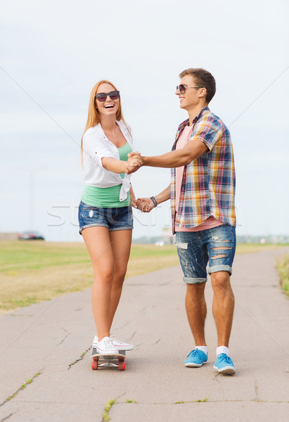 Foto stock: Sonriendo · Pareja · skateboard · aire · libre · vacaciones · vacaciones