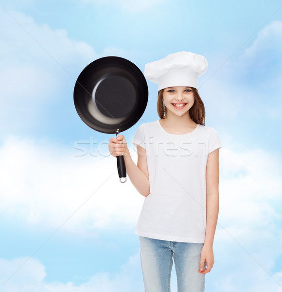 Uśmiechnięty dziewczynka biały tshirt reklamy dzieciństwo Zdjęcia stock © dolgachov