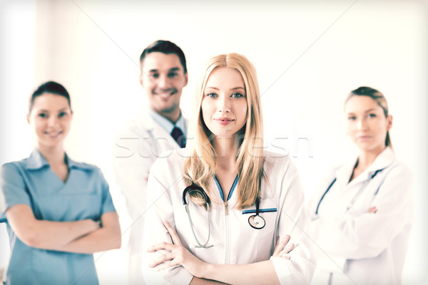 Kobiet lekarza medycznych grupy atrakcyjna kobieta szczęśliwy Zdjęcia stock © dolgachov