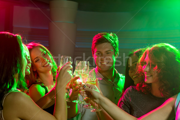 Glimlachend vrienden bril champagne club partij Stockfoto © dolgachov