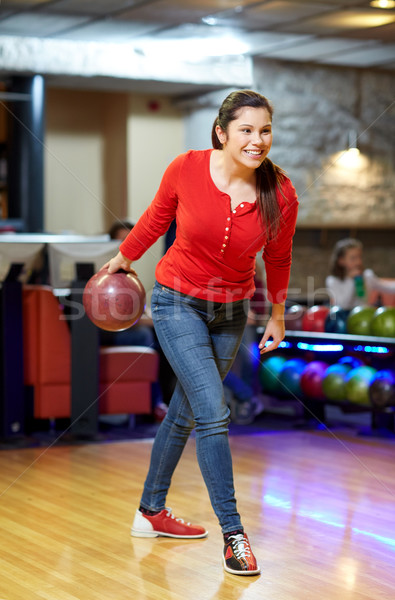 Heureux jeune femme balle bowling club [[stock_photo]] © dolgachov