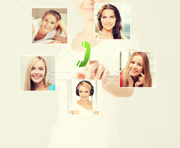 woman with virtual screen and contact icons Stock photo © dolgachov