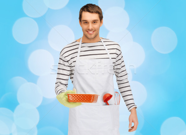 happy man or cook with baking and kitchenware Stock photo © dolgachov