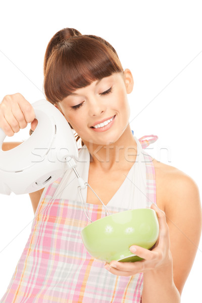 housewife with mixer Stock photo © dolgachov