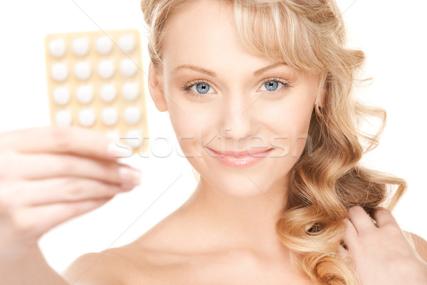 Jonge vrouw pillen foto witte vrouw medische Stockfoto © dolgachov