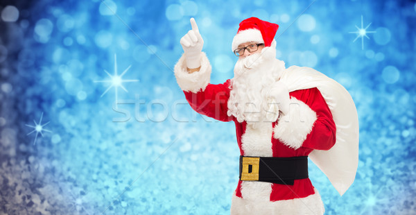 Adam kostüm noel baba çanta Noel tatil Stok fotoğraf © dolgachov