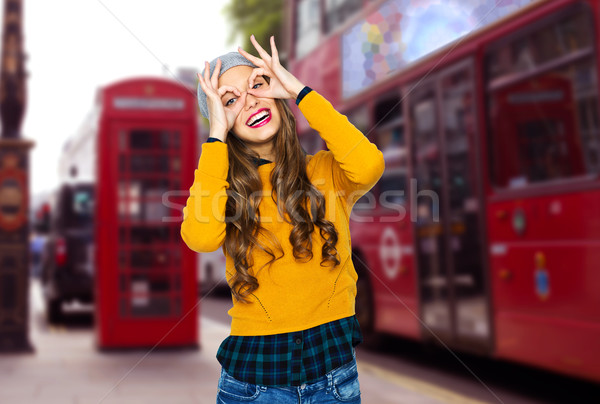 happy young woman or teen girl having fun Stock photo © dolgachov
