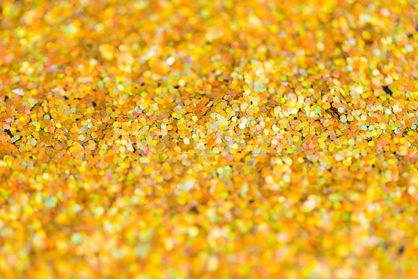 golden glitter or yellow sequins background Stock photo © dolgachov
