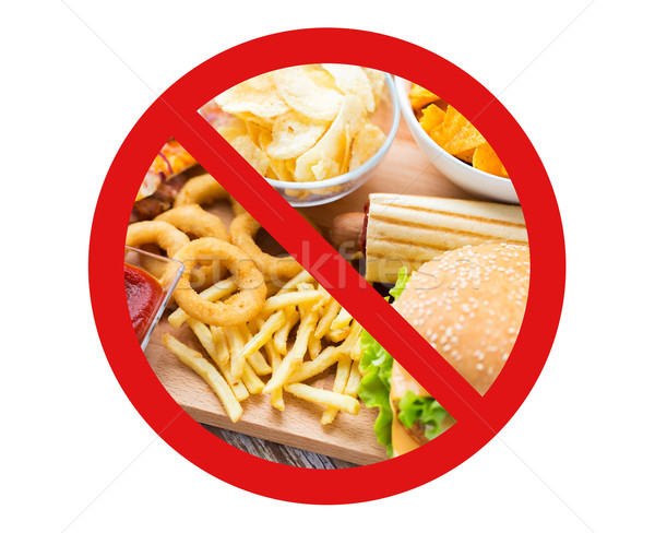 close up of fast food snacks behind no symbol Stock photo © dolgachov