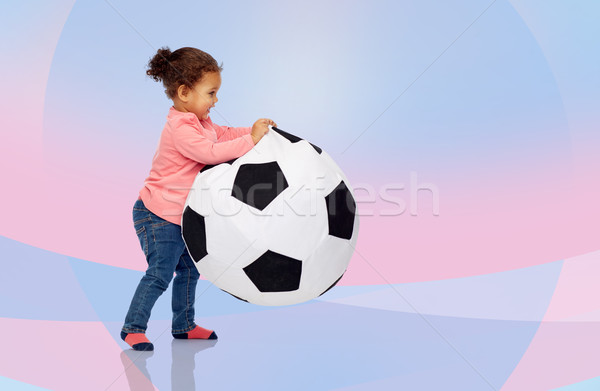 happy mulatto little baby girl playing with ball Stock photo © dolgachov