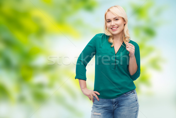 笑みを浮かべて 若い女性 シャツ ジーンズ 女性 夏 ストックフォト © dolgachov