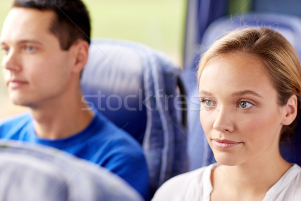 happy young woman sitting in travel bus or train Stock photo © dolgachov