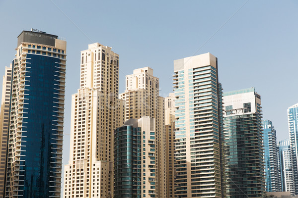 Dubai city business district with skyscrapers Stock photo © dolgachov