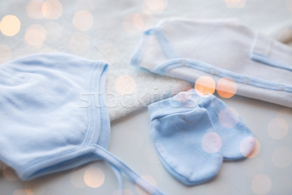 close up of baby boys clothes for newborn on table Stock photo © dolgachov