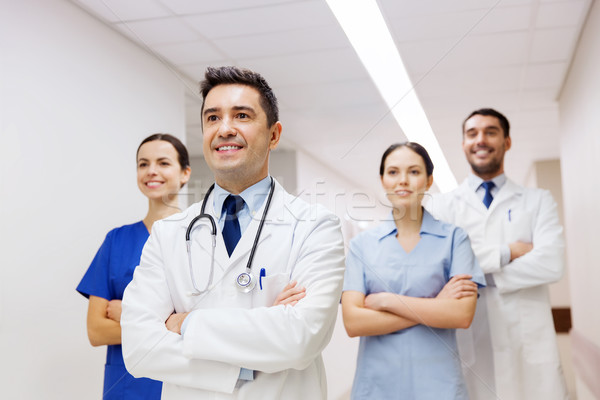 Groupe heureux médecins hôpital clinique profession [[stock_photo]] © dolgachov