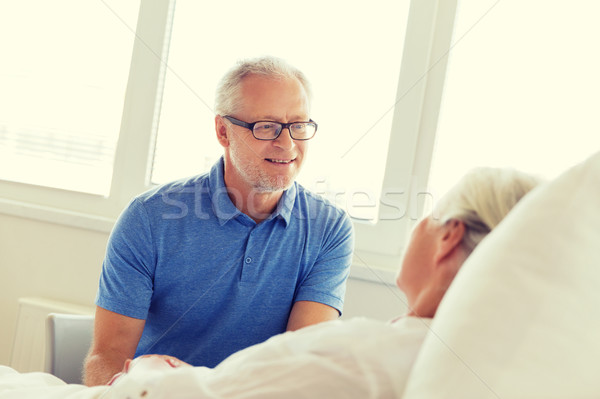 senior couple meeting at hospital ward Stock photo © dolgachov
