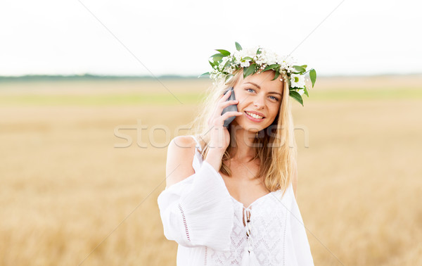 happy young woman calling on smartphone at country Stock photo © dolgachov