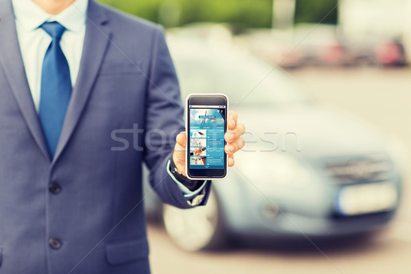 close up of business man with smartphone and car Stock photo © dolgachov