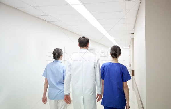 Groupe médecins marche hôpital clinique profession [[stock_photo]] © dolgachov