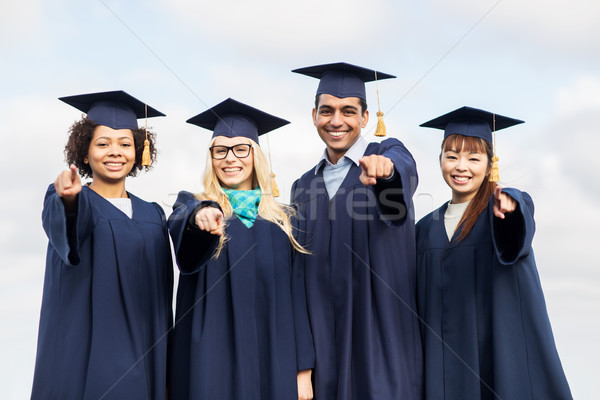 Foto d'archivio: Felice · studenti · scapoli · punta · dito · istruzione