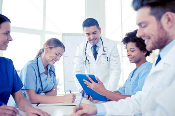 Stock photo: group of happy doctors meeting at hospital office