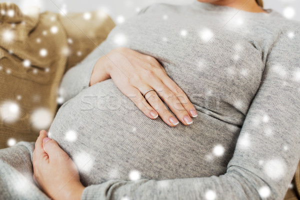 close up of pregnant woman with big belly Stock photo © dolgachov