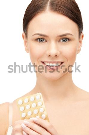 Fiatal gyönyörű nő tabletták kép nő orvosi Stock fotó © dolgachov