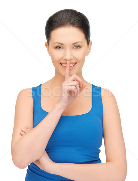 woman making a hush gesture Stock photo © dolgachov