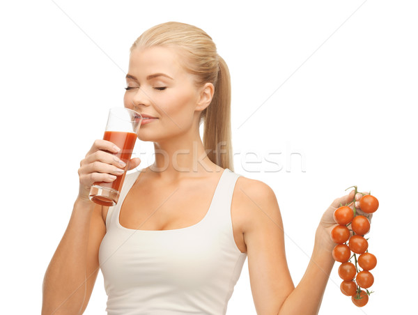 Kadın içme domates suyu domates Stok fotoğraf © dolgachov