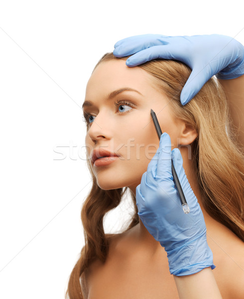 Vrouw gezicht handen potlood cosmetische chirurgie vrouw meisje Stockfoto © dolgachov