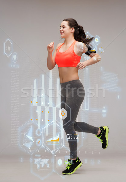 sporty woman running or jumping Stock photo © dolgachov