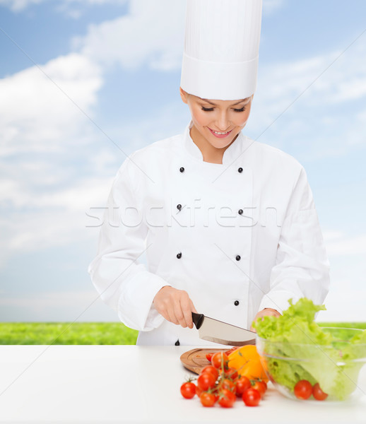 Mosolyog női szakács tapsolás zöldségek főzés Stock fotó © dolgachov