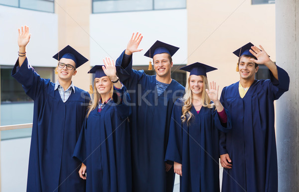 Foto stock: Grupo · sorridente · estudantes · educação · graduação · pessoas