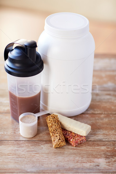 close up of protein food and additives on table Stock photo © dolgachov