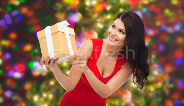 beautiful sexy woman in red dress with gift box Stock photo © dolgachov