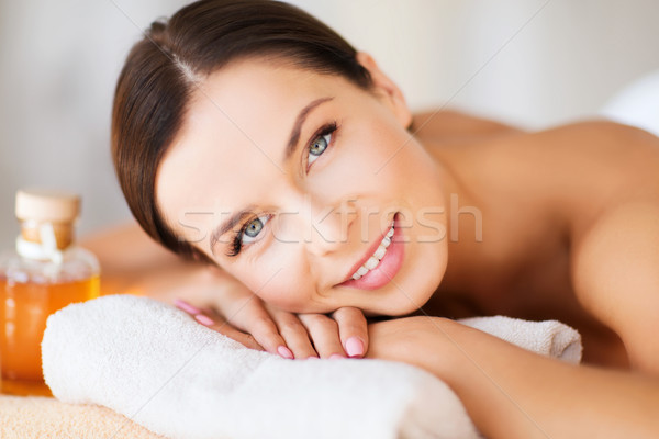 happy woman in spa salon Stock photo © dolgachov