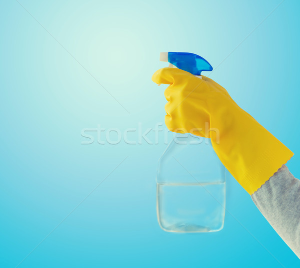 close up of hand with cleanser spraying Stock photo © dolgachov